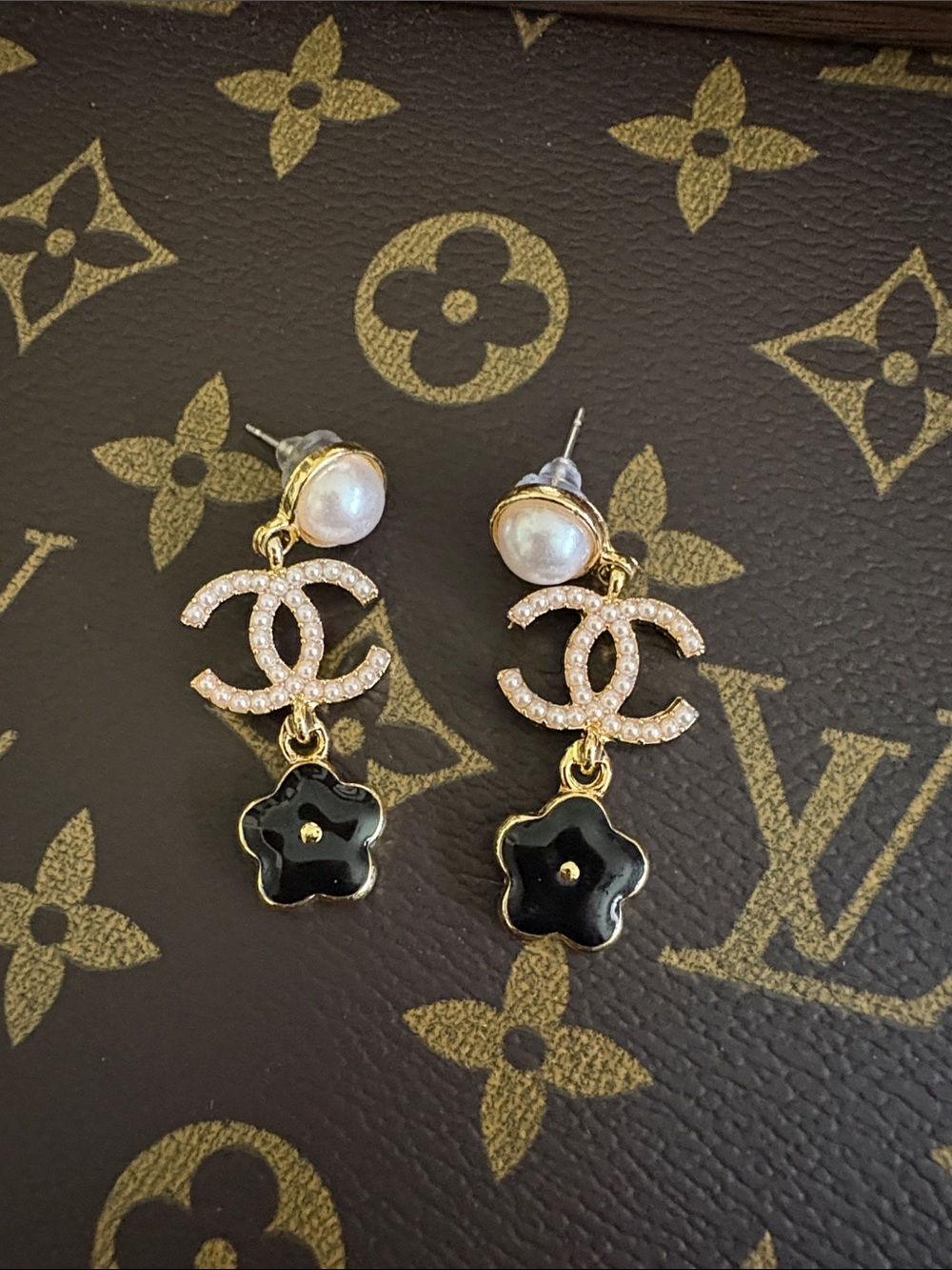 Inspired Gold Tone Faux Pearl Drop Earrings with Black Flower Charm